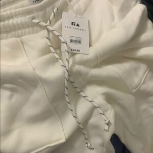 Cream sweatpants